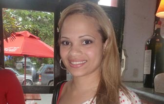 A beautiful colombian woman smiling at the camera